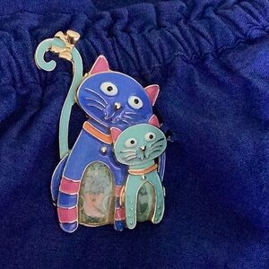 Kitty cat  brooch in Richey colors blues turquoise pinks orange.